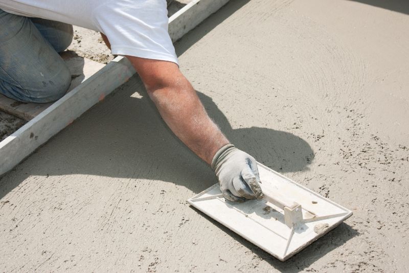 A photo of concrete surface being levelled