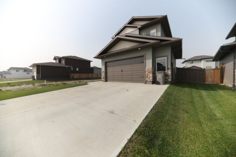 A photo of a driveway leading up to a house in Childers